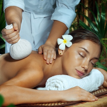 Relaxing thai massage with thai herbs